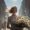 woman in city holding flowers